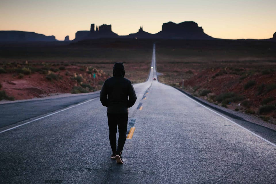 Person Walking - Photo by Tegan Mierle on Unsplash